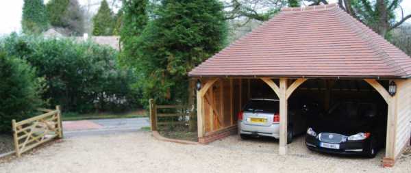 Фото гараж в доме – небольшой деревянный или кирпичный с пространством на 2 машины под одной крышей, проекты с мансардой и с подземным парковочным местом